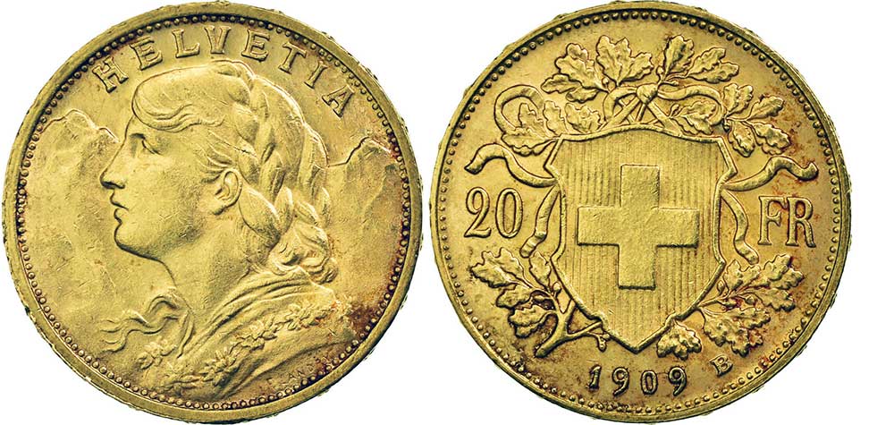 cara y cruz de la moneda de 20 francos suizos vreneli 1909, una moneda de oro de 5,80 gramos.